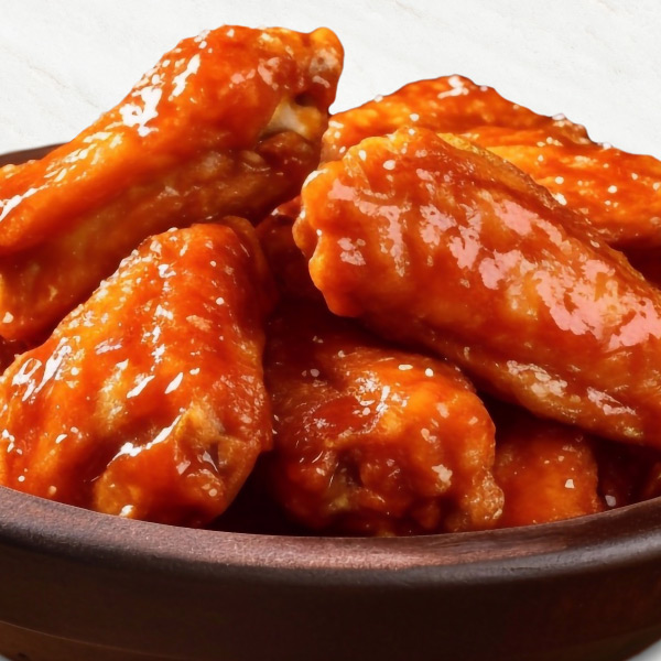 Indulge in fiery bliss with our tantalizing chicken hot wings recipe, boasting crispy golden skin and a lip-smacking sauce. This recipe offers a mouthwatering experience for wing enthusiasts.