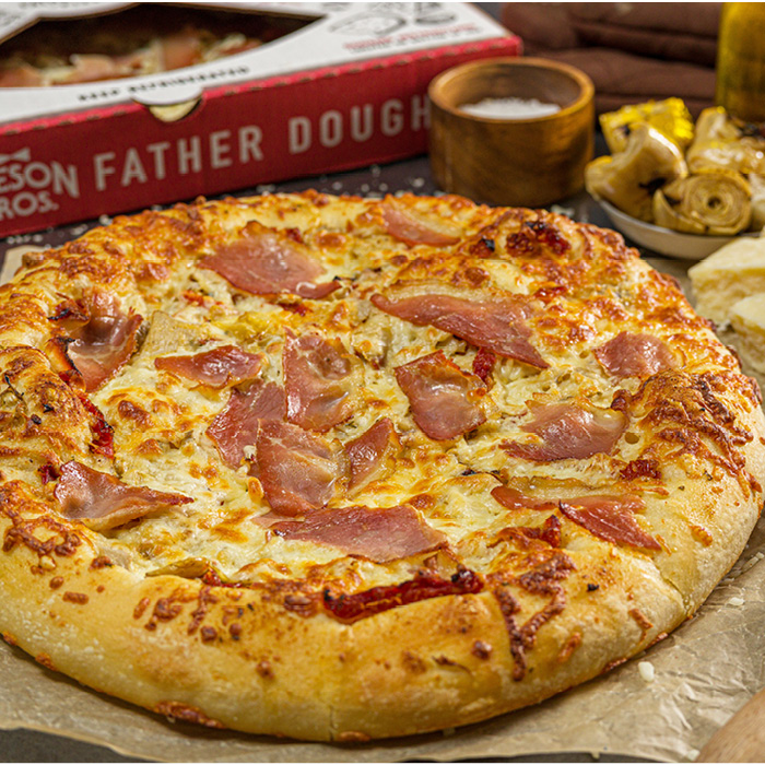 This November and December, don't miss out on Prosciutto & Artichoke Pizza! Available in our deli to take and bake.